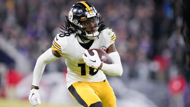 Steelers wide receiver Diontae Johnson (18) runs with the ball during a game against the Ravens.